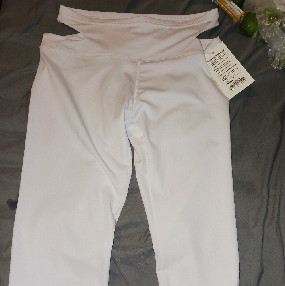 white leggings with openings on the hip
